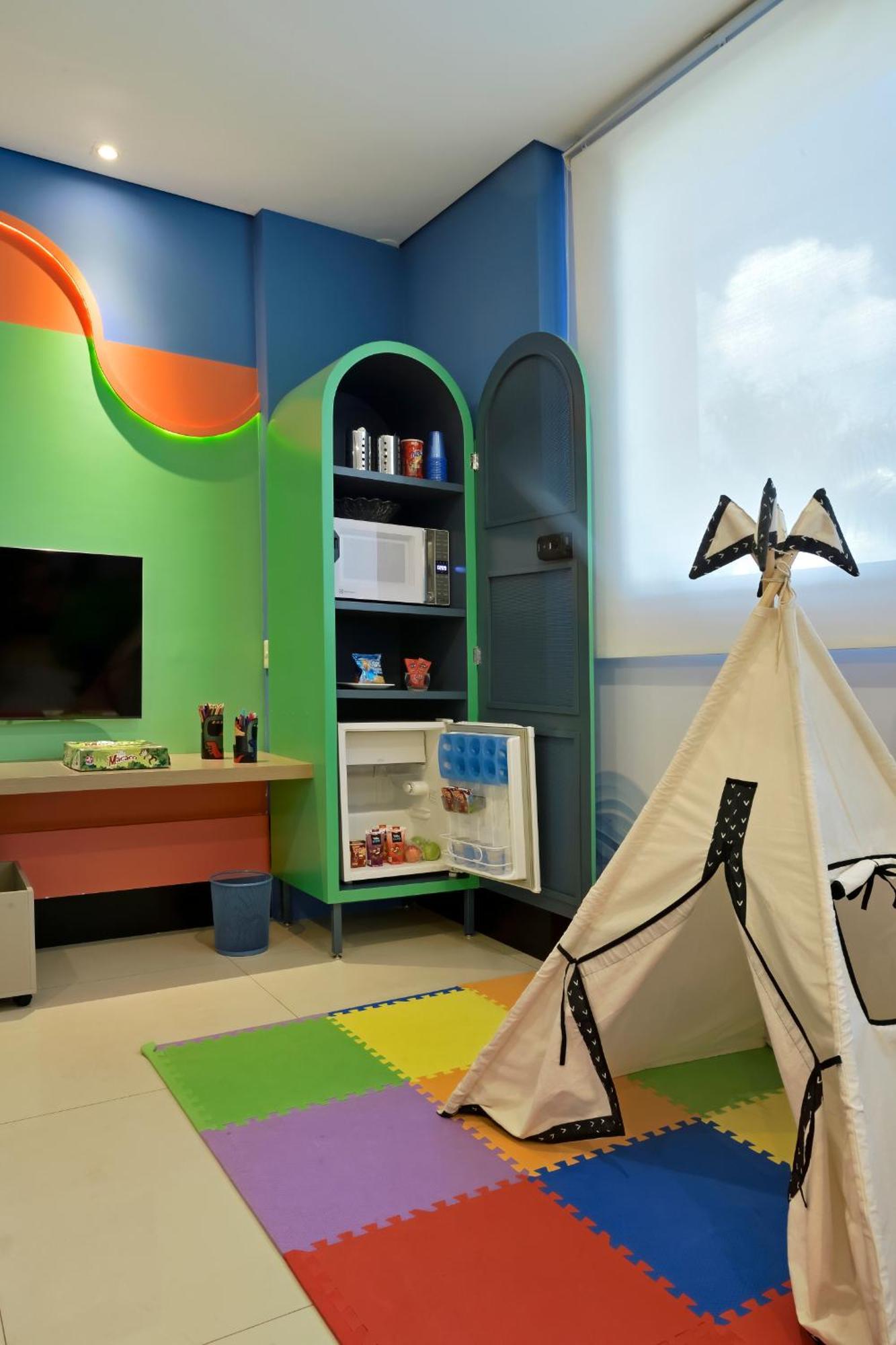 Hotel Mont Blanc Premium Ribeirao Preto Luaran gambar A child's room with a mini-refrigerator
